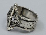 an image of a silver ring with a lock on it