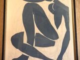 painting of a man and a woman sitting on a couch
