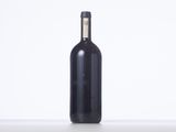 a bottle of wine that is sitting on a table