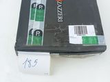 a box of pizza sitting on a table with a price tag