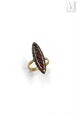 a close up of a ring on a white surface