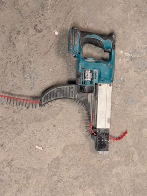 a picture of a corded saw on the ground