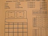 an image of a cardboard box with a picture of a bed in it