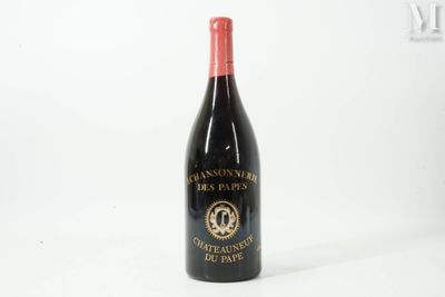 a bottle of wine that is sitting on a table