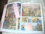 a picture of a comic book open on a bed