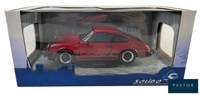 red toy car in a box on a white background