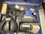 a blue box with a bunch of electronics inside of it
