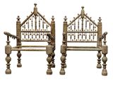 pair of antique iron beds with wooden posts and posts