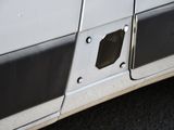 a small hole in the side of a car ' s door