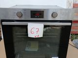 an oven that is sitting on top of a cardboard box