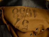 a close up of a brown bag with writing on it