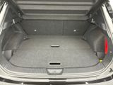 a trunk of a car with the back seats folded down