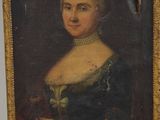 portrait d'une femme en robe verte tenant un bouquet de fleurs