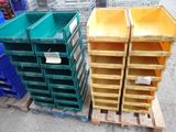 many plastic bins stacked on a pallet in a warehouse