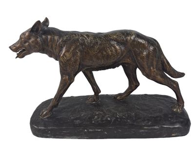 bronze statue of a wolf on a black base
