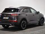 the rear end of a grey 2020 audi qx