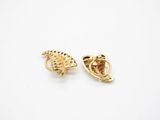 a pair of gold tone earrings with a fish design