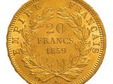 a close up of a gold coin on a white background