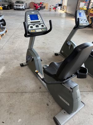 an image of a stationary exercise bike in a garage