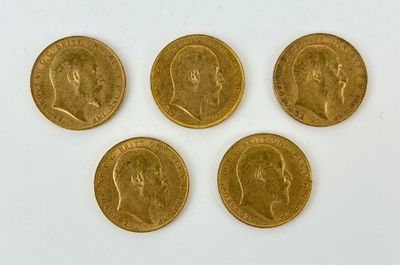 four gold sovereigns, one of which has a head of a man and four of which have a face