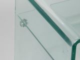 clear glass side table with a glass top and metal legs