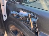 a car door with the door handle missing and the door handle missing