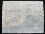 a close up of a piece of paper with writing on it