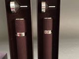 pair of wine openers in a box with a purple box