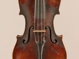 an old violin with a wooden case and bow on a white background