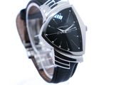an image of a watch with a black face