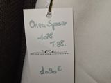 a label on a white shirt with a price tag attached to it