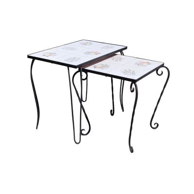 pair of wrought iron tables with tile top and wrought legs