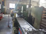 a picture of a machine shop with a lot of machines in it