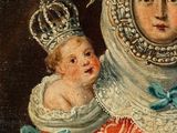 an old painting of a woman holding a baby wearing a crown