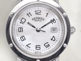 a close up of a wrist watch with a white dial