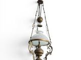 an old fashioned hanging light fixture with a glass shade on it