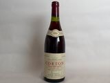 a bottle of wine that is sitting on a table