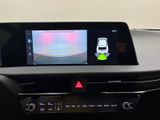 an image of a car ' s dashboard with a car ' s rear view camera
