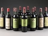 six bottles of wine are lined up in a row on a table
