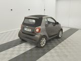 a small car that is parked in a garage