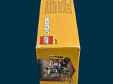 a box of legos sitting on a blue surface