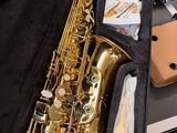 a saxophone that is in a case on a table