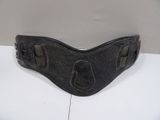 black leather belt with metal buckles on a white surface