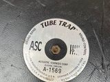 a label on the side of a tube trap that says asc
