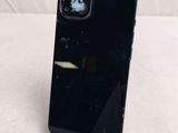 a close up of a cell phone that is on a stand