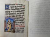 an open book with a picture of a woman on it