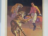 une grande affiche représentant un dompteur de cirque avec un tigre dessus
