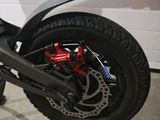a motorcycle that is parked in a garage