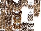 several different types of butterflies are displayed on a white surface