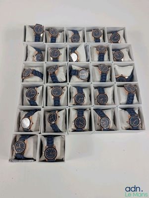 a lot of watches in a box on the table